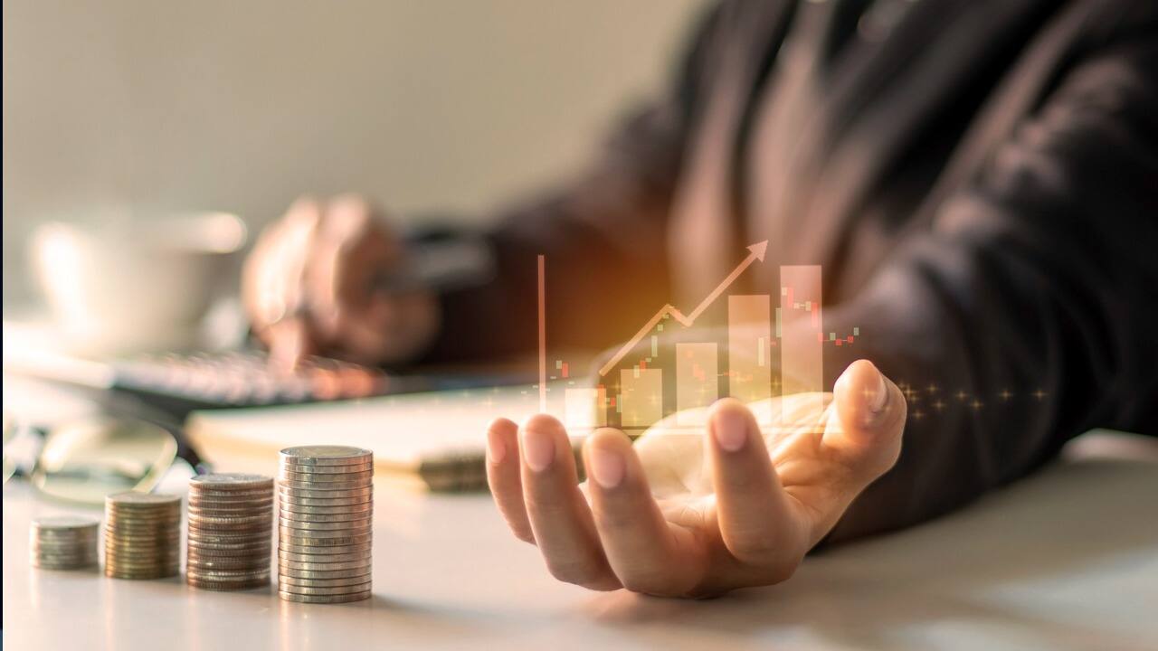 Investor analyzing bond charts with rising yields and state finance indicators