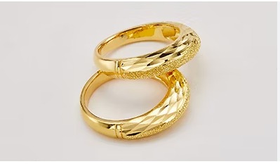 Gold jewelry display with price tags in Srinagar market