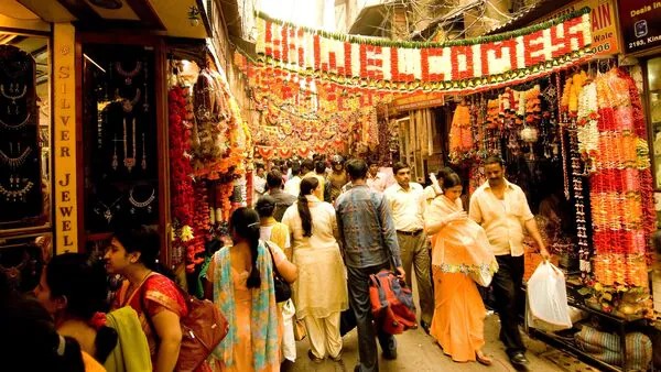 Shoppers at a decorated mall during India’s festive season under GST 2.0 regime
