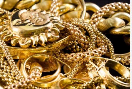 Gold jewelry showing 18K, 22K, and 24K purity