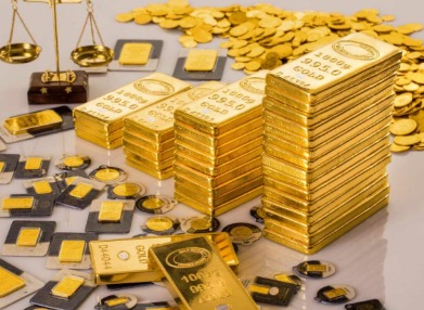 Gold bars and coins reflecting safe-haven investment