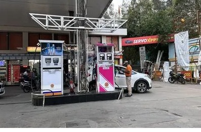 Petrol and diesel prices displayed at a fuel station