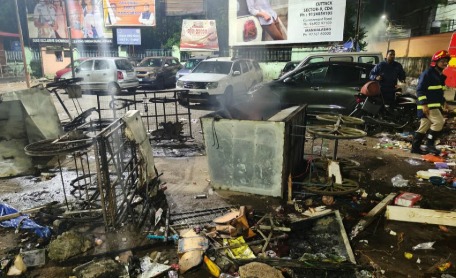 Police enforcing curfew in Cuttack streets during internet shutdown following clashes in Odisha.