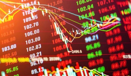 Stock traders watching live market data on digital screens as Sensex and Nifty open higher in early trade.