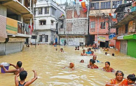 Rescue team evacuating residents from flood-affected areas in West Bengal.