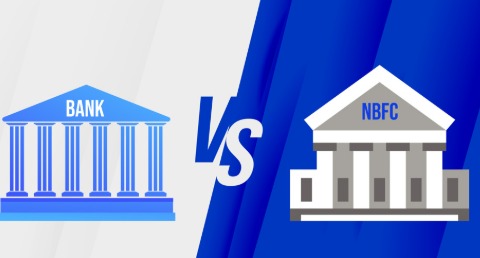 Small business owner reviewing loan offers from an NBFC and a bank in India.