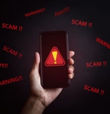 Smartphone screen showing fake loan app scam warning in India.
