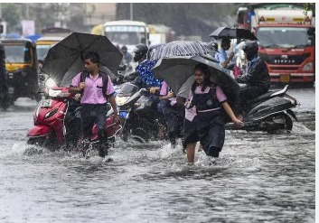 Heavy rainfall over Indian city with traffic and cloudy sky