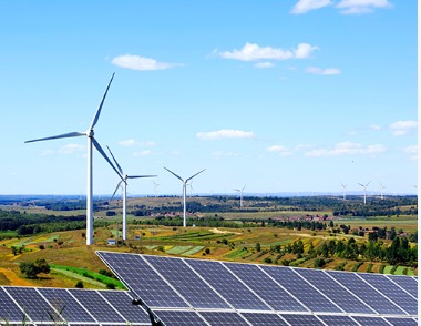 Wind turbines and solar panels symbolizing India’s net zero carbon goals