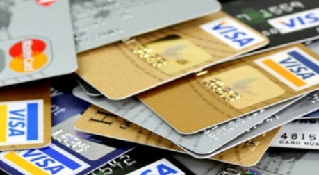 Premium credit card with Diwali lights and shopping items