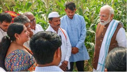 PM Modi addressing farmers during launch of new agricultural schemes