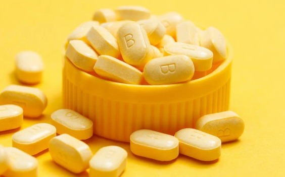 “Vitamin B3 capsules and healthy skin concept – nicotinamide supplement benefits for skin cancer prevention”