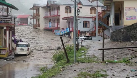 Flooded village in India with rescue operations underway
