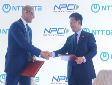 Indian tourists scanning UPI QR code in Japan