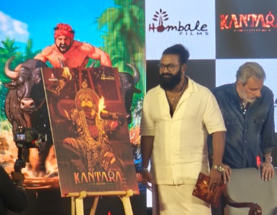 Rishab Shetty posing at a promotional event for Kantara 1