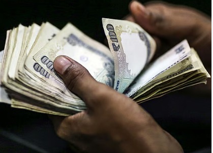 Person receiving instant funds via Vizzve Finance personal loan for an emergency