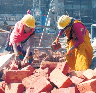Workers in India returning to jobs, symbolizing labour force growth