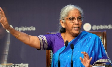 Finance Minister Nirmala Sitharaman announcing GST rate cut monitoring on essential items.