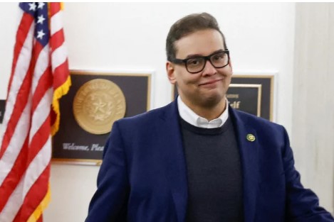 “George Santos walking into federal court amid fraud charges”