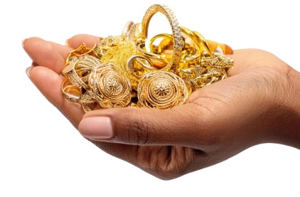 Customer pledging gold jewelry for a gold loan at a bank.