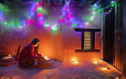 Darjeeling streets illuminated with candles and lamps during Diwali Tihar festival.
