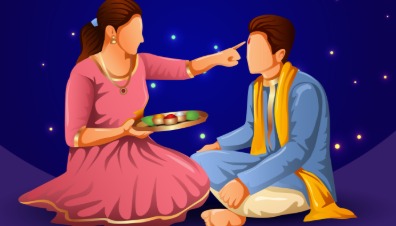Sister performing Bhai Dooj tilak ceremony on brother’s forehead with traditional sweets and puja thali