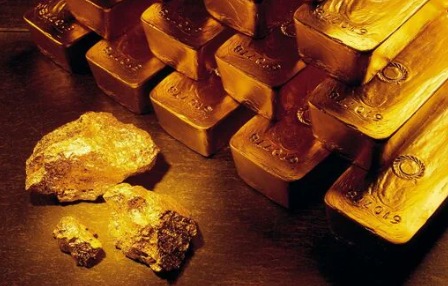 Bank teller examining gold bars for collateral loans amid price volatility