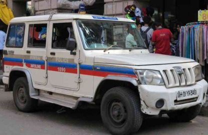 Hospital exterior with police personnel at the scene following the tragic death of a woman doctor in Maharashtra