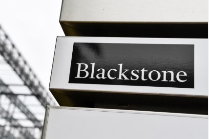 Blackstone logo alongside Federal Bank building indicating stake acquisition
