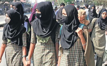 Students in Kerala school wearing hijabs attending class.