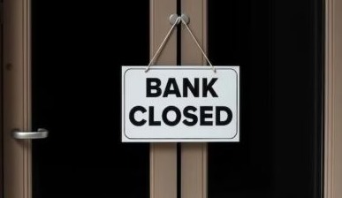 Bank closed sign during scheduled bank holiday on 25 October.