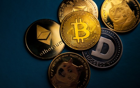 Cryptocurrency coins and digital ledger representing digital asset ownership in India