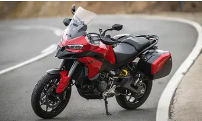 2025 Ducati Multistrada V2 showcased in India with red finish and LED headlights.