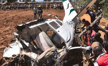 Kenyan rescue workers at the site of a plane crash in the Rift Valley region.