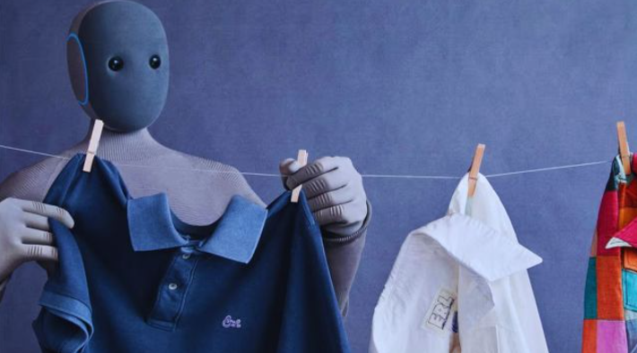 NEO humanoid robot assisting in a kitchen environment