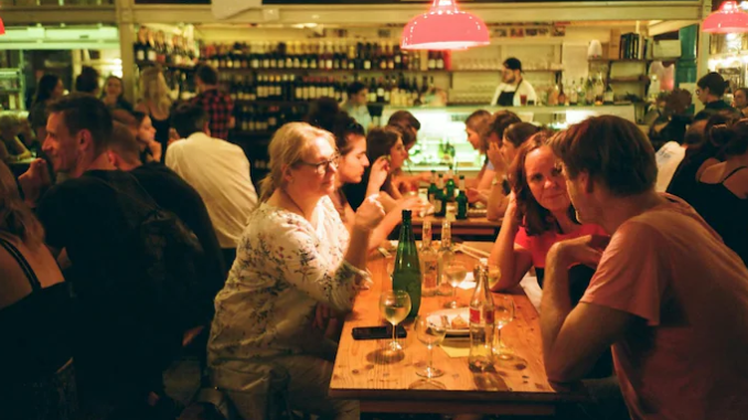 Restaurant buffet setup with tourists in Switzerland