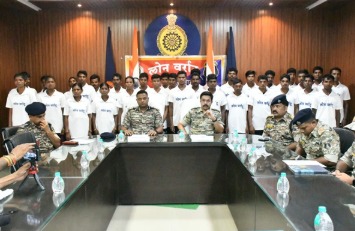 Chhattisgarh police officials with surrendered Maoists during rehabilitation ceremony in Dantewada under the Lone Varatu campaign
