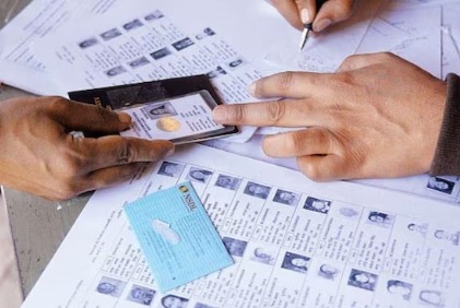Election officials in Bihar verifying voter lists during the voter roll revision drive ahead of assembly polls