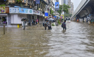 Flooded Indian street during heavy rains as delayed monsoon hits multiple states in 2025