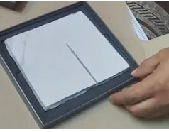 Bengaluru techie shows parcel with tile received instead of expensive smartphone ordered online.