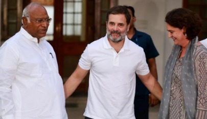 Rahul Gandhi, Priyanka Gandhi, and Mallikarjun Kharge addressing a rally ahead of the Bihar Elections 2025