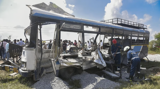 "Rescue teams at Telangana bus accident site assisting survivors and assessing damage"