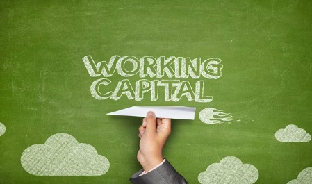 Business owner reviewing working capital expenses while applying for a personal loan through Vizzve Finance.