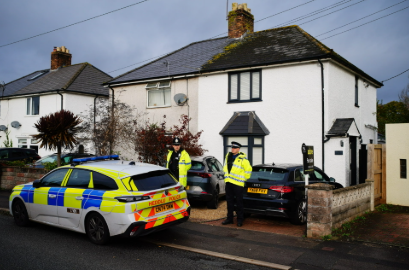 Police at the scene in Rogiet, Wales, after a reported fatal dog attack.