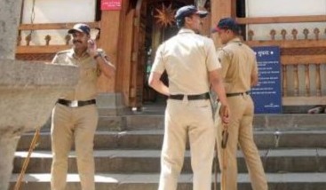 Police officers conducting a raid at a doctor’s house in Hyderabad