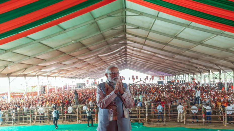 Prime Minister Narendra Modi speaking at an election rally addressing supporters