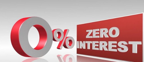 A person reading fine print on a 0% EMI offer receipt, highlighting hidden loan charges.