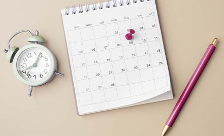 A borrower checking EMI schedule on a mobile app while planning to change the repayment date for a personal loan.