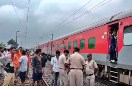 Police and railway officials inspecting the site of a train accident at a Uttar Pradesh railway station.