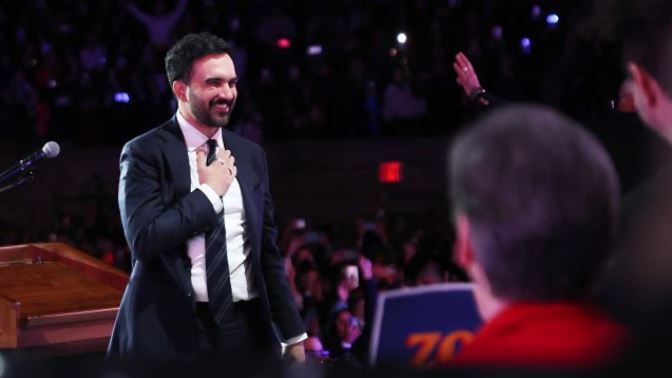 “Zohran Mamdani celebrating victory at his New York City mayoral election rally”
